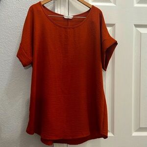 Entro burnt orange flowy top size medium